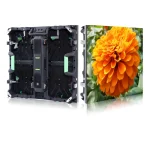 Modular LED display panel with a vibrant orange flower image on one side.