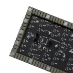 Close-up view of an electronic circuit board featuring various components and connections.