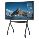 Interactive touchscreen display mounted on a mobile stand with wheels, showing a mountain landscape on the screen.