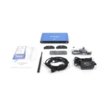 Colorlight LED controller with remote, cables, power adapter, and documentation laid out on a white background.